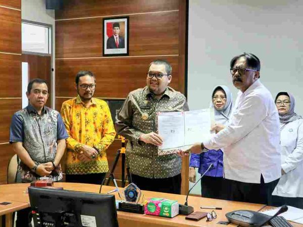 Penandatanganan Nota Kesepahaman (MoU) Antara Pemkab Parimo Dengan Kementerian Sosial