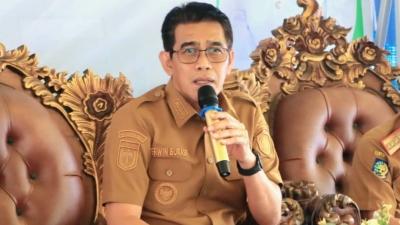 Bupati Erwin Burase Buka Sosialisasi PIK-R dan Kukuhkan Ayah Bunda Genre di Wilayah Eks Parigi